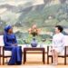 Peng Liyuan chats over tea with the wife of the Senegalese president