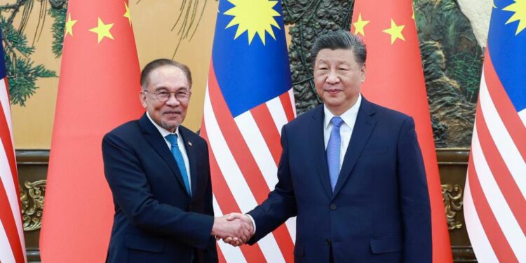 Xi Jinping meets Malaysian PM, calling for jointly building a community with a shared future