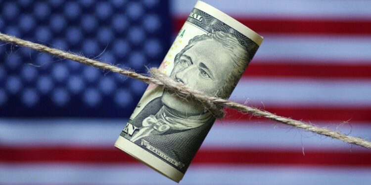 The Federal Reserve maintains the federal fund interest rate target range unchanged