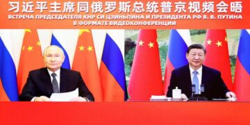 Xi Jinping holds talks with Vladimir Putin, calling on China and Russia to uphold international fairness and justice