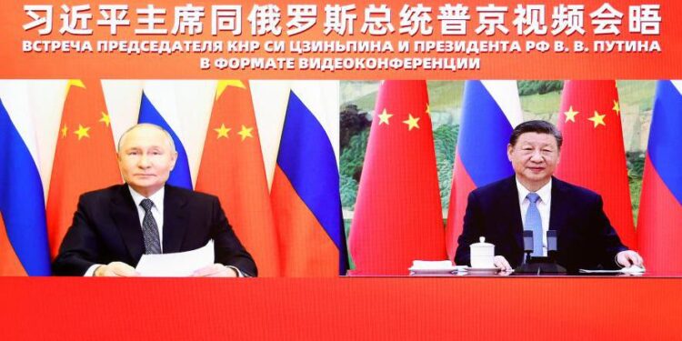 Xi Jinping holds talks with Vladimir Putin, calling on China and Russia to uphold international fairness and justice