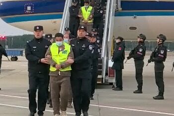 200 suspects who were escorted out of the plane on the scene