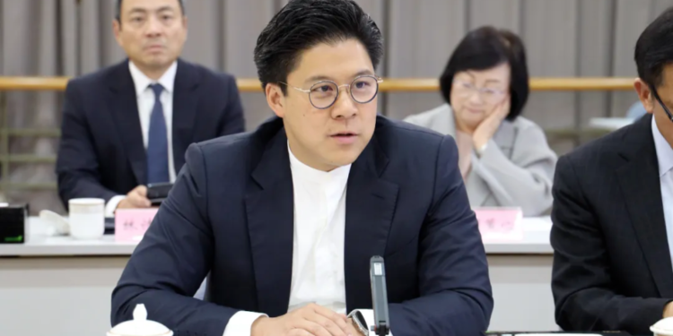 Ho Qigang, elected to a new position