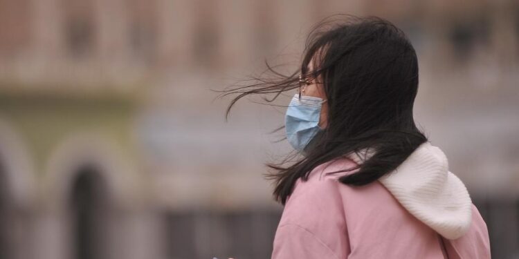 Beijing issues blue warning signal for strong winds