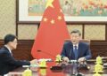 Xi Jinping listens to report from HKSAR chief executive