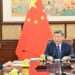 Xi Jinping listens to a report from Macao SAR Chief Executive