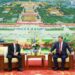 Xi Jinping and Vladimir Putin talk over tea in Beijing